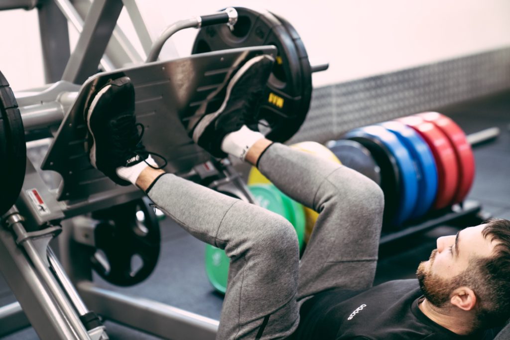 Abbotsford Gym 24/7 member exercising on leg press